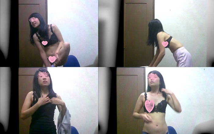 看護師が職場ロッカーで着替え